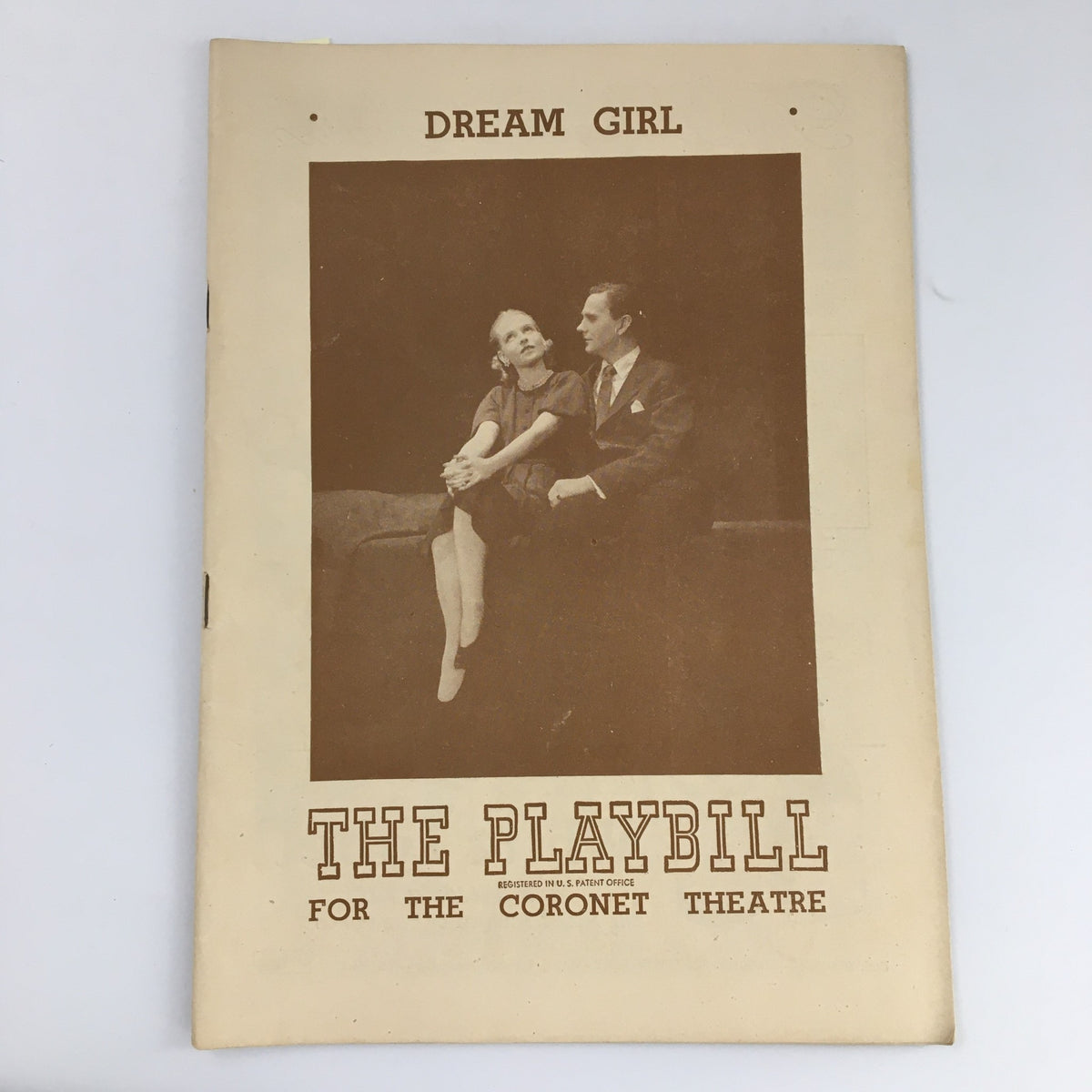 1945 Playbill for 'Dream Girl' at The Coronet Theatre featuring a vintage design with actors displayed on the cover.