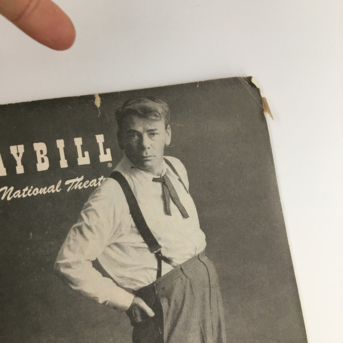 Close-up view of the 1956 Playbill for the National Theatre's 'Inherit The Wind', highlighting the iconic design and details of Ed Begley’s photograph.