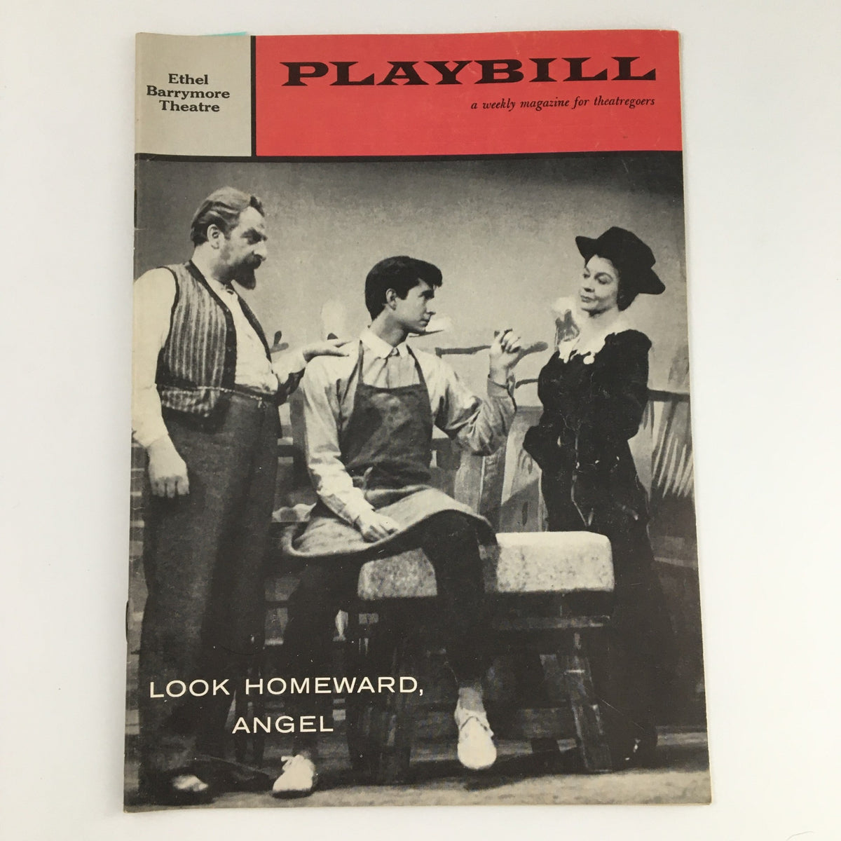 Vintage 1957 Playbill for 'Look Homeward, Angel' at the Ethel Barrymore Theatre featuring Arthur Hill in a theatrical scene.
