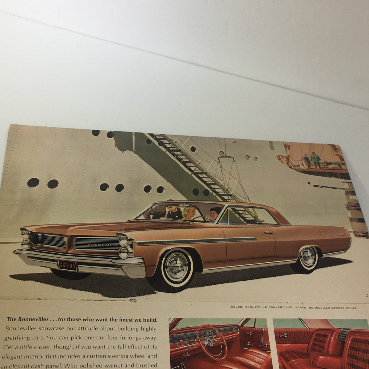 Inside page of the 1963 Pontiacs' The Bonnevilles Convertible 2-Door Sedan Car Catalog Brochure showcasing a Pontiac vehicle and interior details.