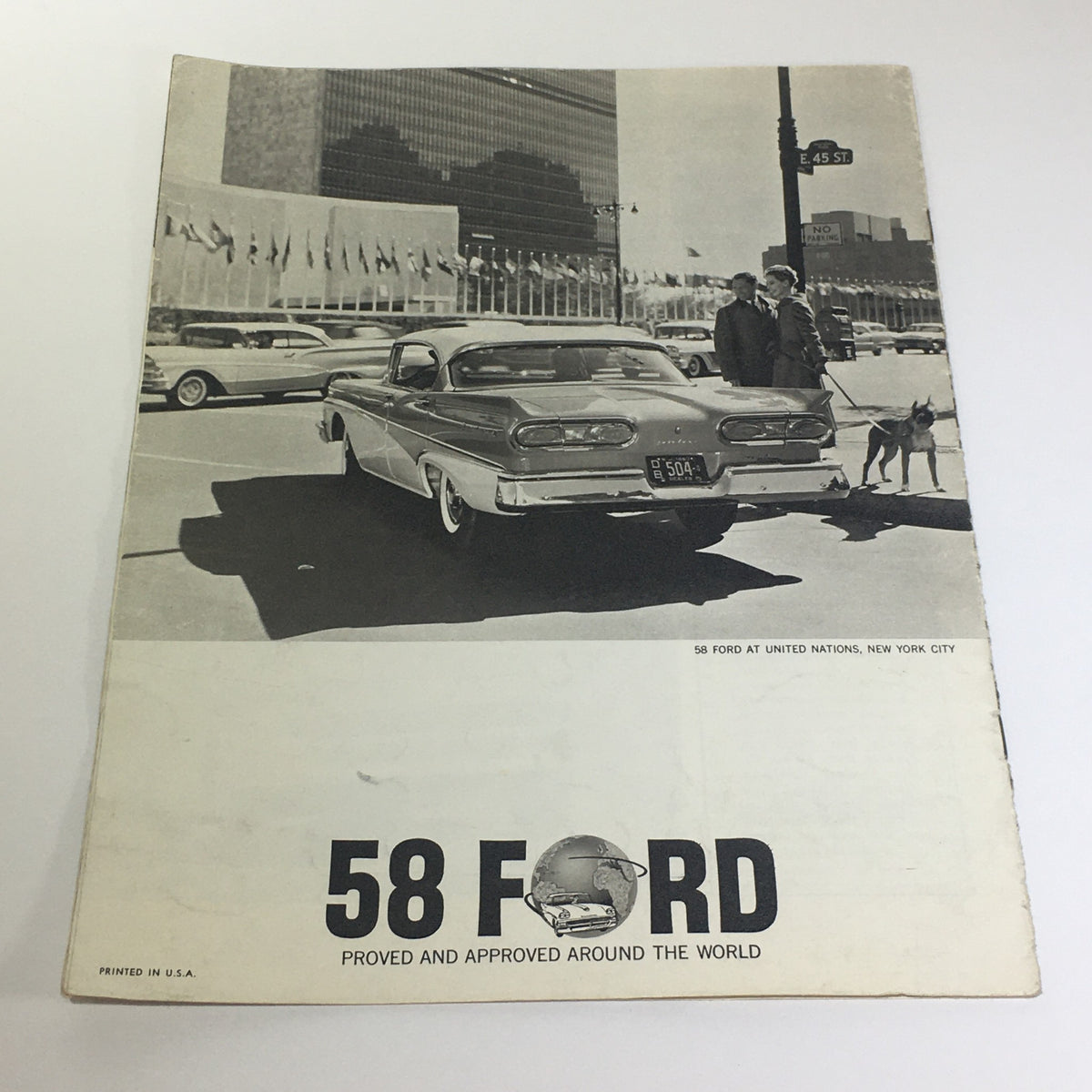 Back cover of the 1958 Ford 2-Door Sedan Hardtop Russian Frontier Car Catalog Brochure showcasing a Ford vehicle in front of the United Nations in New York City, emphasizing its international approval.