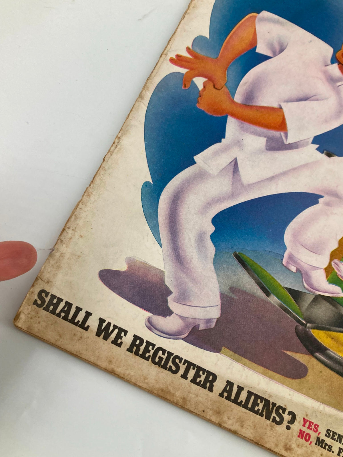 Close-up of the cover of VTG Liberty Magazine February 3, 1940 highlighting the text 'Shall We Register Aliens?' and featuring playful artwork.