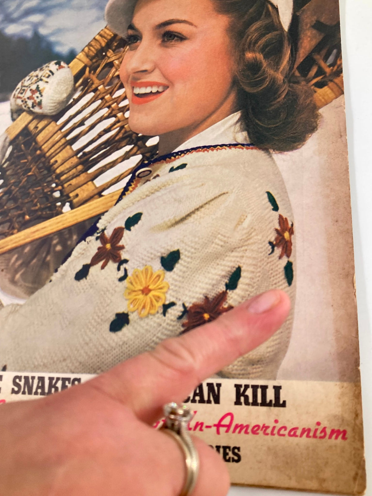 Close-up of the cover of VTG Liberty Magazine January 13 1940 showing a woman in winter clothing and detailing the article 'More Snakes Than I Can Kill'.