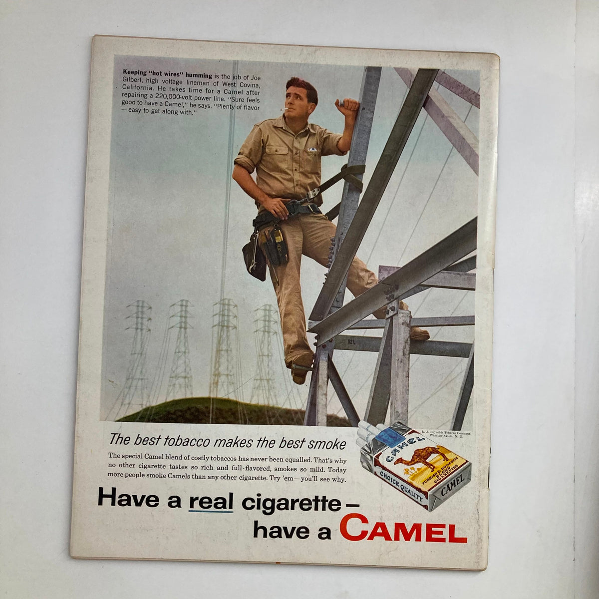 Advertisement from the Vintage Look Magazine March 4, 1958, Volume 22 No. 5, showcasing a man as a lineman promoting Camel cigarettes, with a focus on the slogan about quality tobacco.