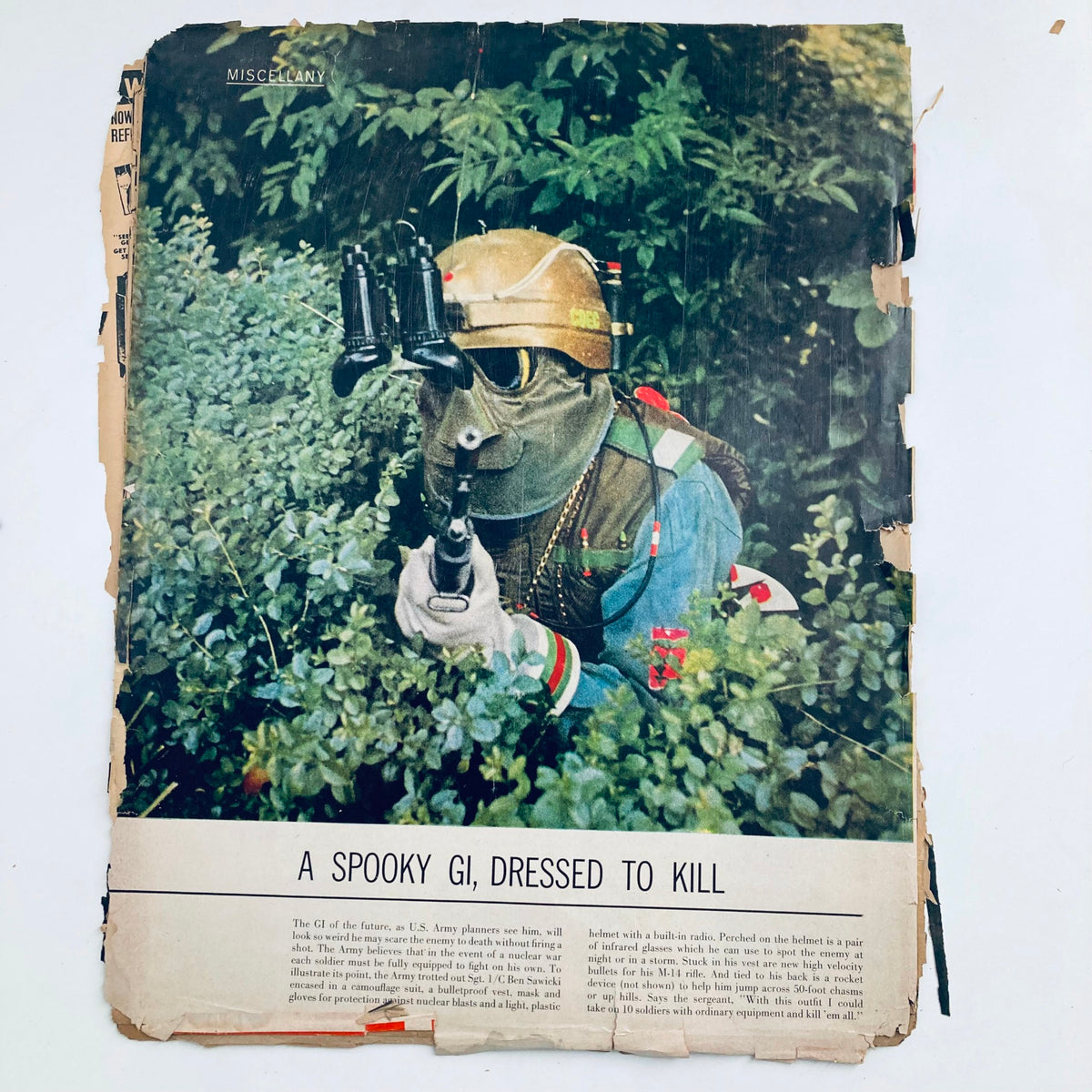 VTG Laff Magazine September 1942 featuring an article titled 'A Spooky GI, Dressed to Kill' with a soldier in a camouflage outfit holding a weapon amidst foliage.