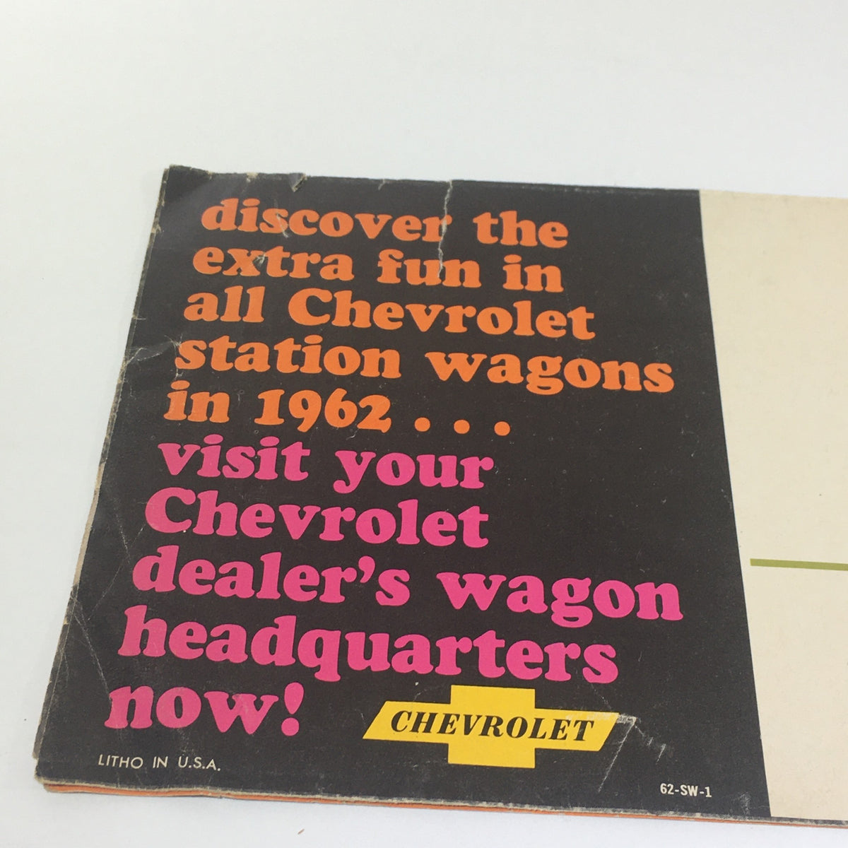 Close-up of the back cover of the 1962 Chevrolet Station Wagons Nova 400 & Chevy II 300 & 400 Car Catalog Brochure highlighting dealership advertisement and vintage design.
