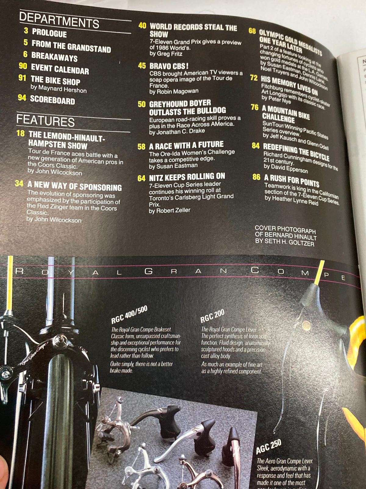 Interior page of Winning Bicycle Racing Illustrated November 1985, displaying articles and features about prominent cycling events, including the Lemond-Hinault-Hampsten Show and various cycling parts.