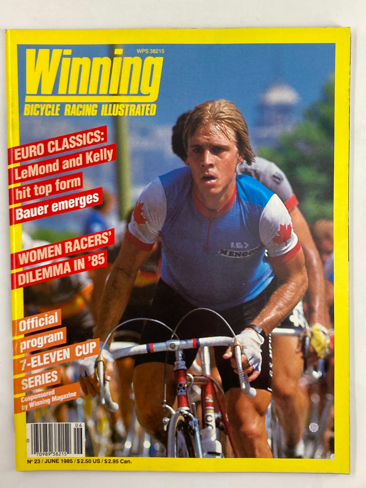 Cover of VTG Winning Bicycle Racing Illustrated magazine, June 1985, featuring prominent cyclist Steve Bauer. The vibrant yellow background highlights articles on Euro Classics and racing strategies.