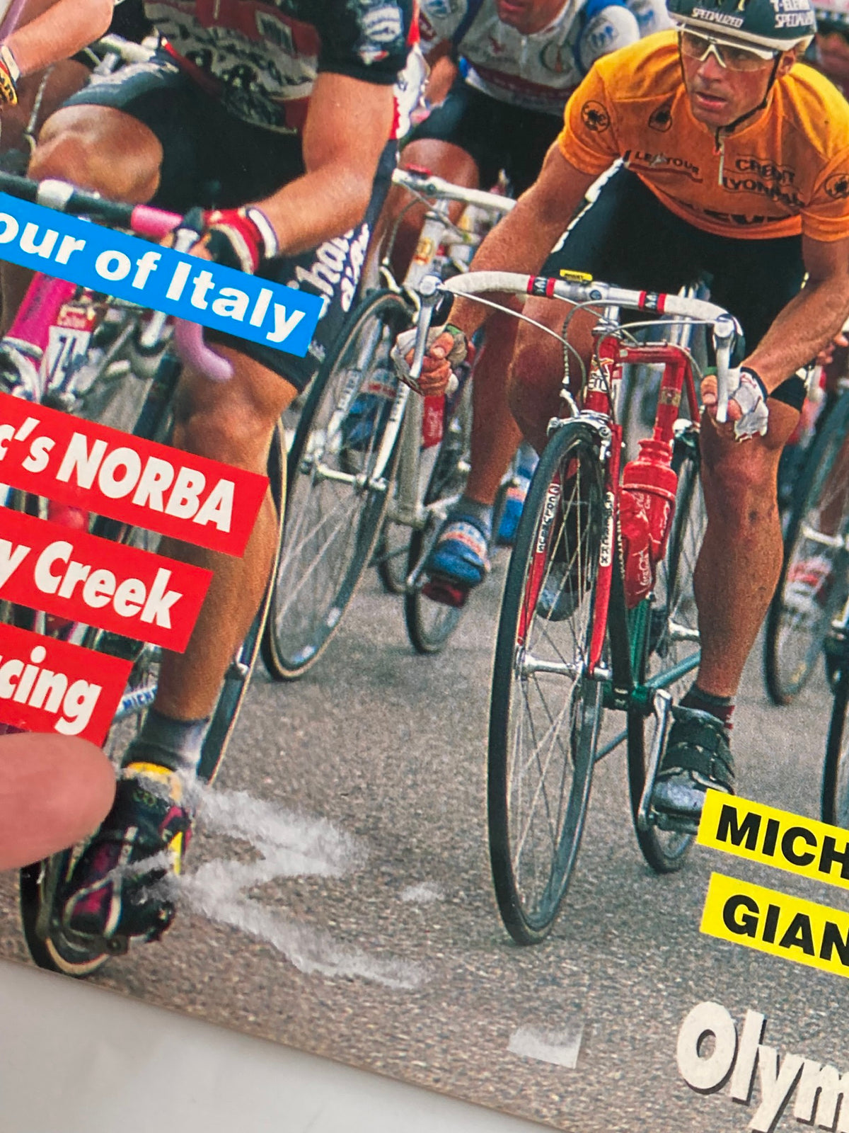 Action-packed scene from Winning Bicycle Racing Illustrated September 1990 featuring competitive cyclists racing during the Tour of Italy, showcasing the intensity of professional cycling.