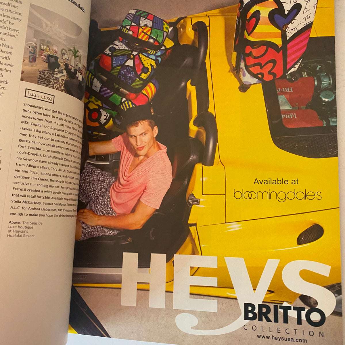 W Magazine January 2010 featuring Jennifer Garner, showcasing the HEVS Britto Collection advertisement with a stylish individual in a convertible amidst bright yellow and colorful accents.