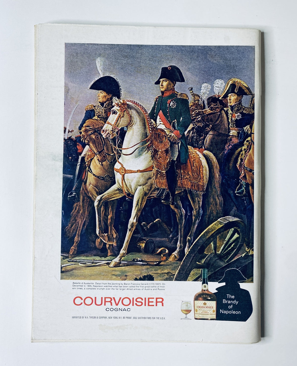 The New Yorker Magazine September 18, 1965, featuring an advertisement for Courvoisier cognac with a historical depiction of Napoleon on horseback, highlighting the brand as 'The Brandy of Napoleon.'