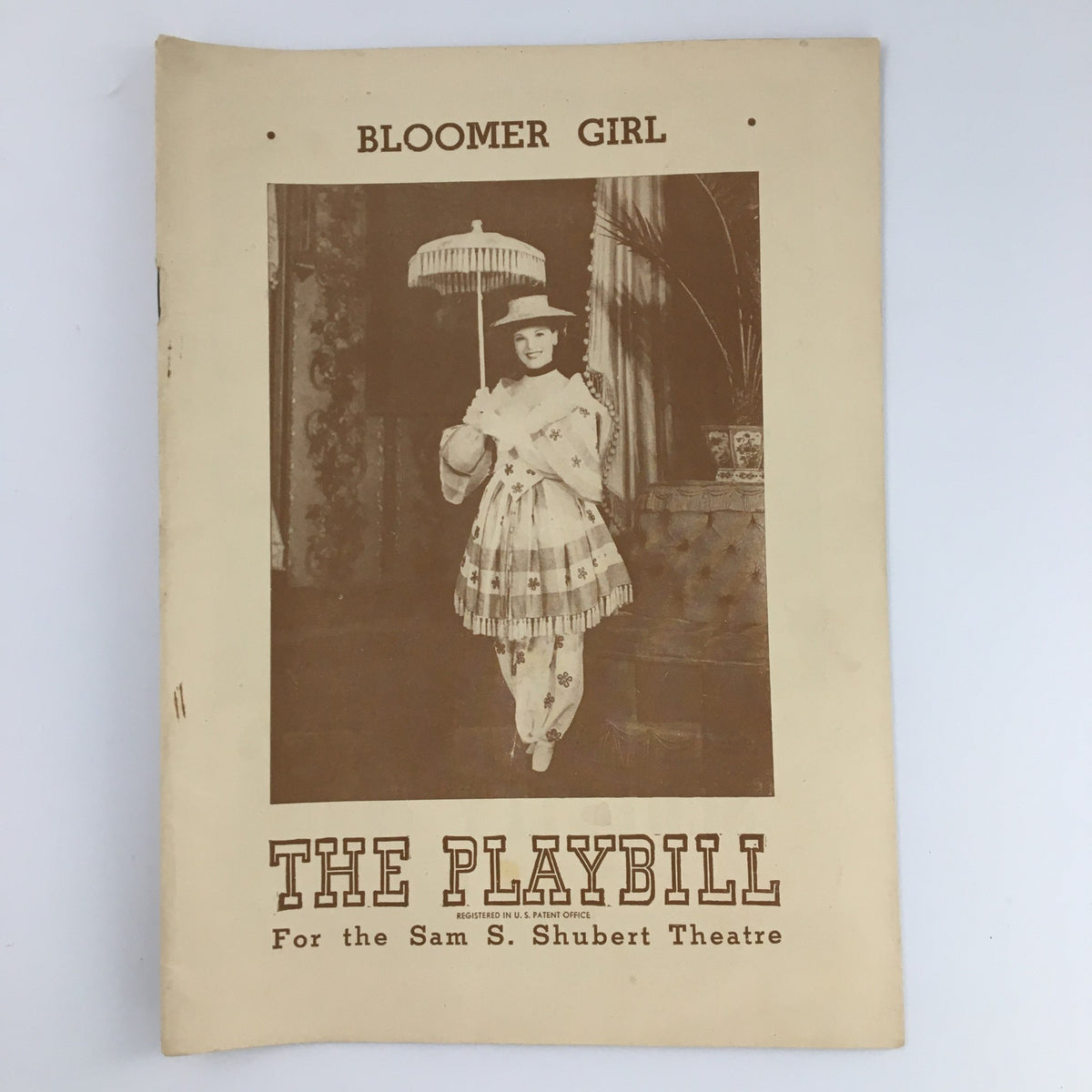 1945 Playbill for 'Bloomer Girl' at the Sam S. Shubert Theatre featuring a vintage cover image with a performer in period costume.