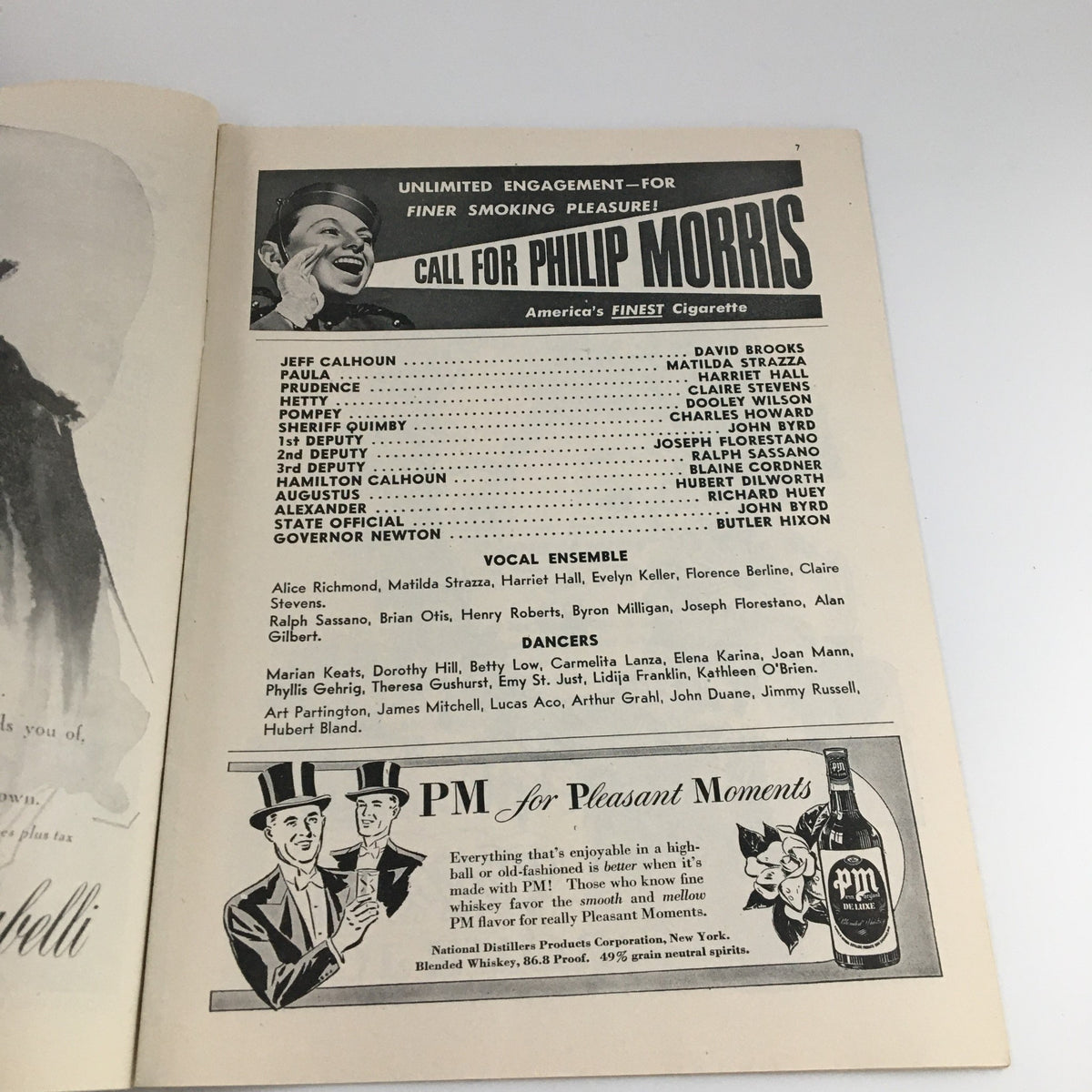 A page from the 1945 Playbill for 'Bloomer Girl' showing a cast list and advertisements for Philip Morris cigarettes.