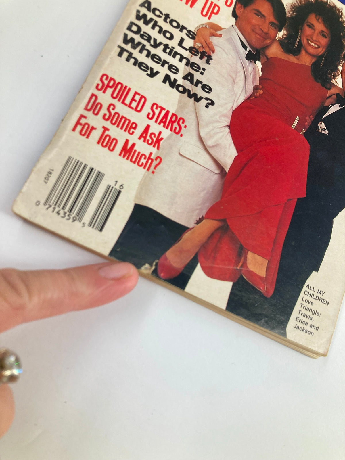 Close-up of the cover of Soap Opera Digest April 17 1990 showing the magazine title and a small puncture with the text about spoiled stars and character narratives.