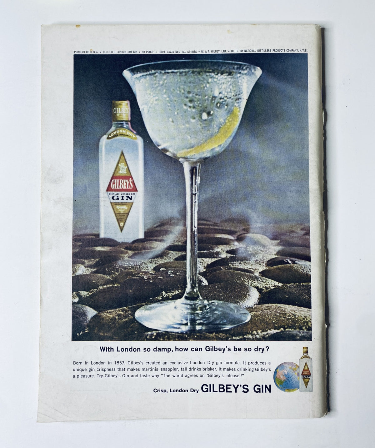 Back cover of The New Yorker Magazine April 3, 1965, featuring an advertisement for Gilbey's Gin with a close-up of a cocktail glass and product branding.