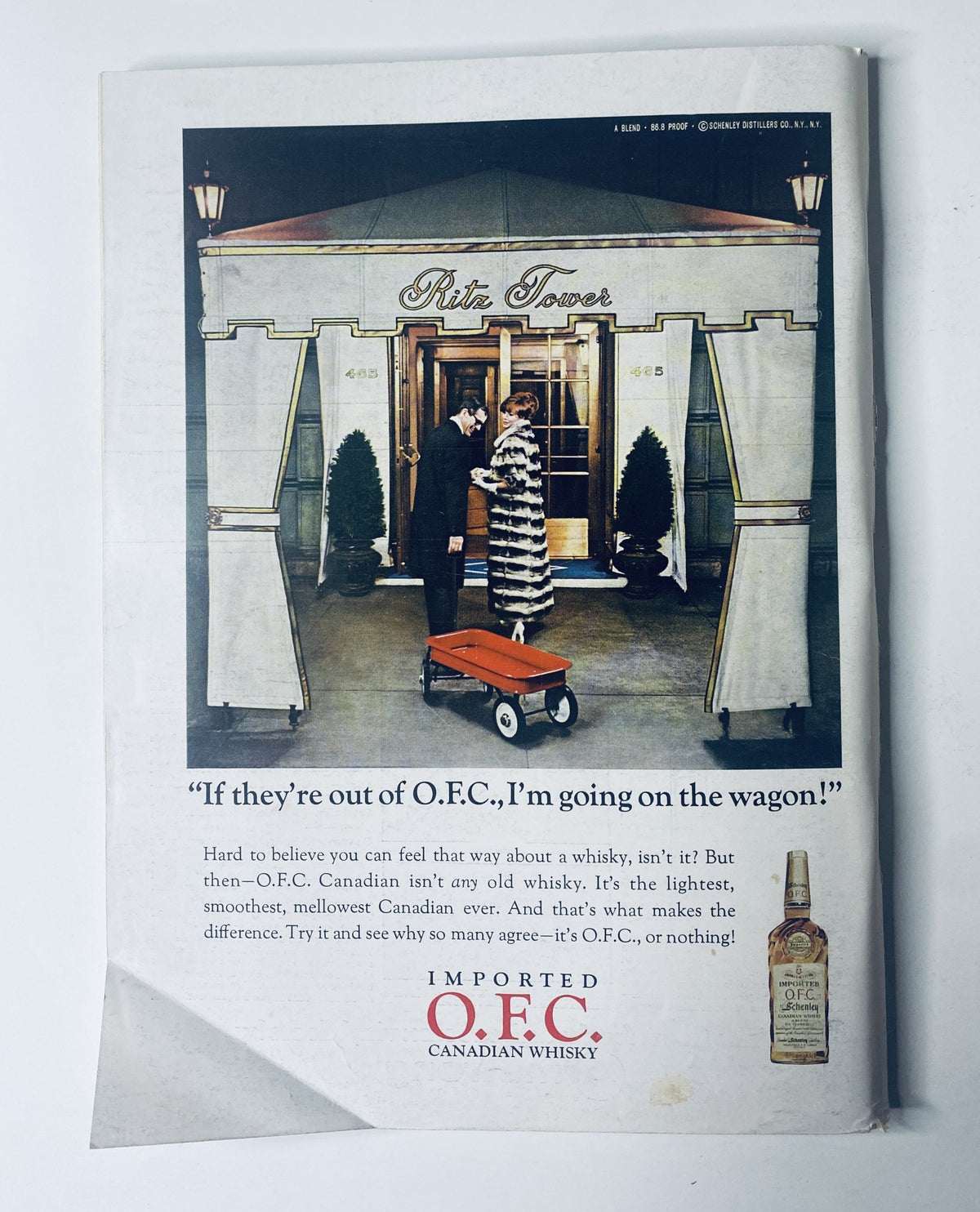 Advertisement from The New Yorker Magazine, October 22, 1966, showcasing Ritz Tower and O.F.C. Canadian Whisky, capturing a stylish scene with a couple at the entrance.