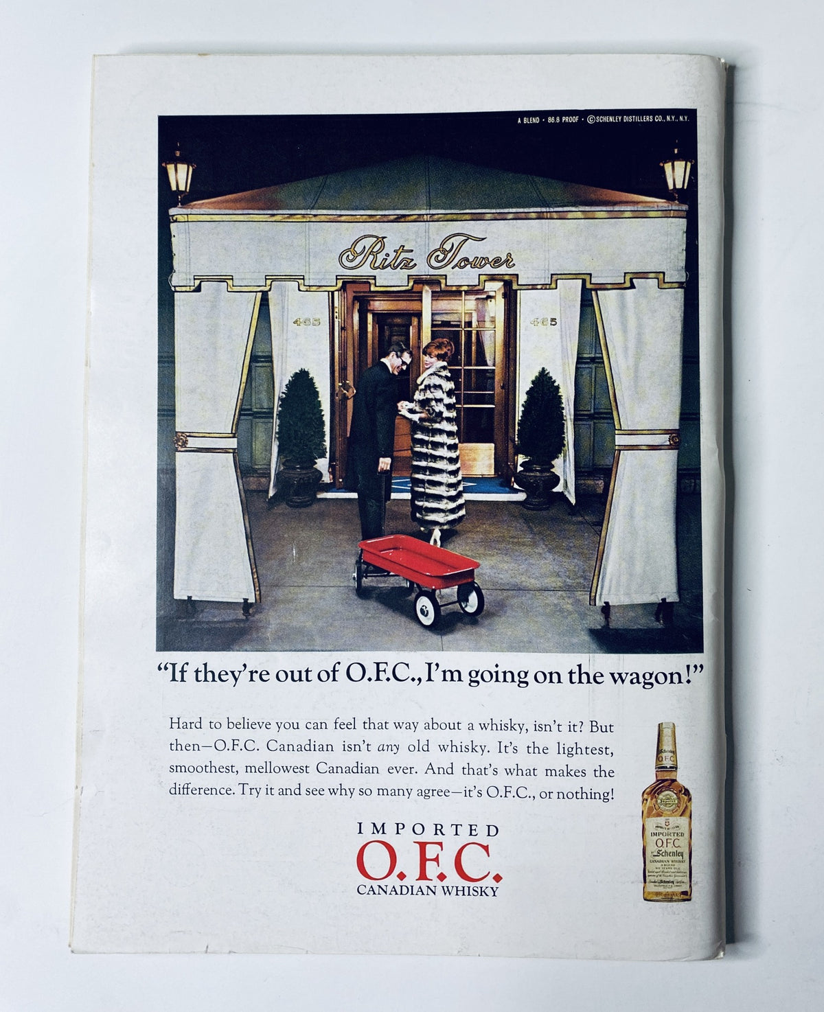 Advertisement from The New Yorker Magazine September 24, 1966 for O.F.C. Canadian whisky, featuring a man and woman at the Ritz Tower, emphasizing a light and smooth whisky experience.