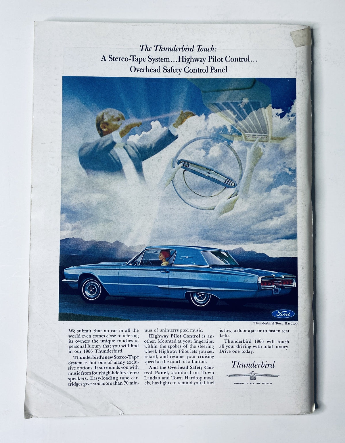 Advertisement for the Thunderbird Touch, featuring a blue car and safety control panel, from The New Yorker Magazine April 16, 1966 Cartoon Car Road Trip Cover C. D. Saxon.