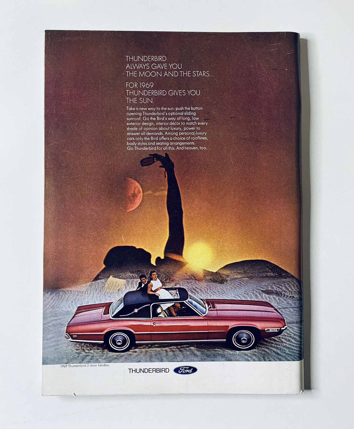 Back cover advertisement for the 1969 Thunderbird car in The New Yorker Magazine, November 23, 1968, featuring a couple in a convertible against a striking sunset backdrop.