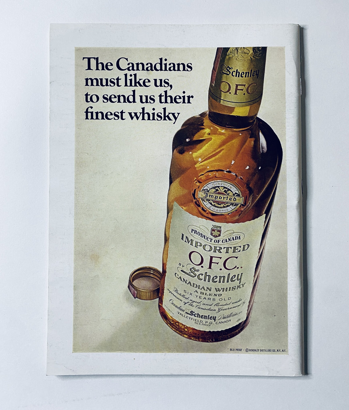 The New Yorker Magazine June 1, 1968 advertisement displaying a bottle of O.F.C. Canadian Whisky with the tagline regarding Canadian sentiments.