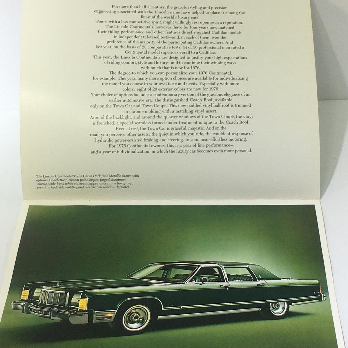 Inside view of the Vintage 1976 Lincoln Continental Town Car Opt. Coach Roof Car Catalog Brochure featuring a classic green Lincoln Continental and detailed text.