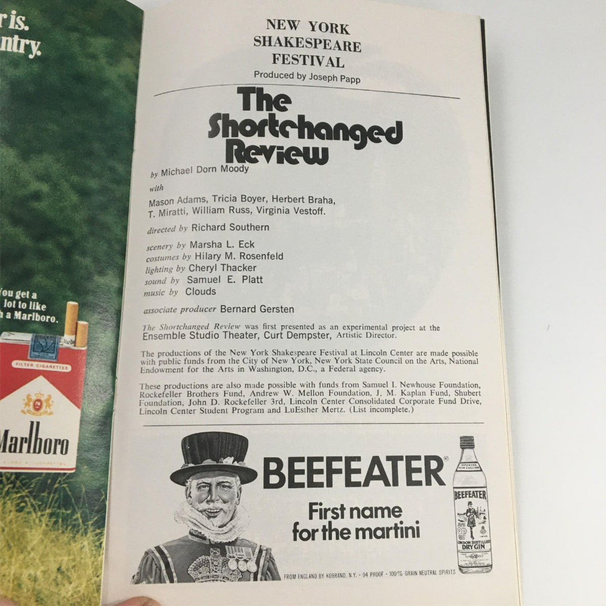 Another page from the 1976 Playbill for 'The Shortchanged Review', including cast information and advertisements from the era.