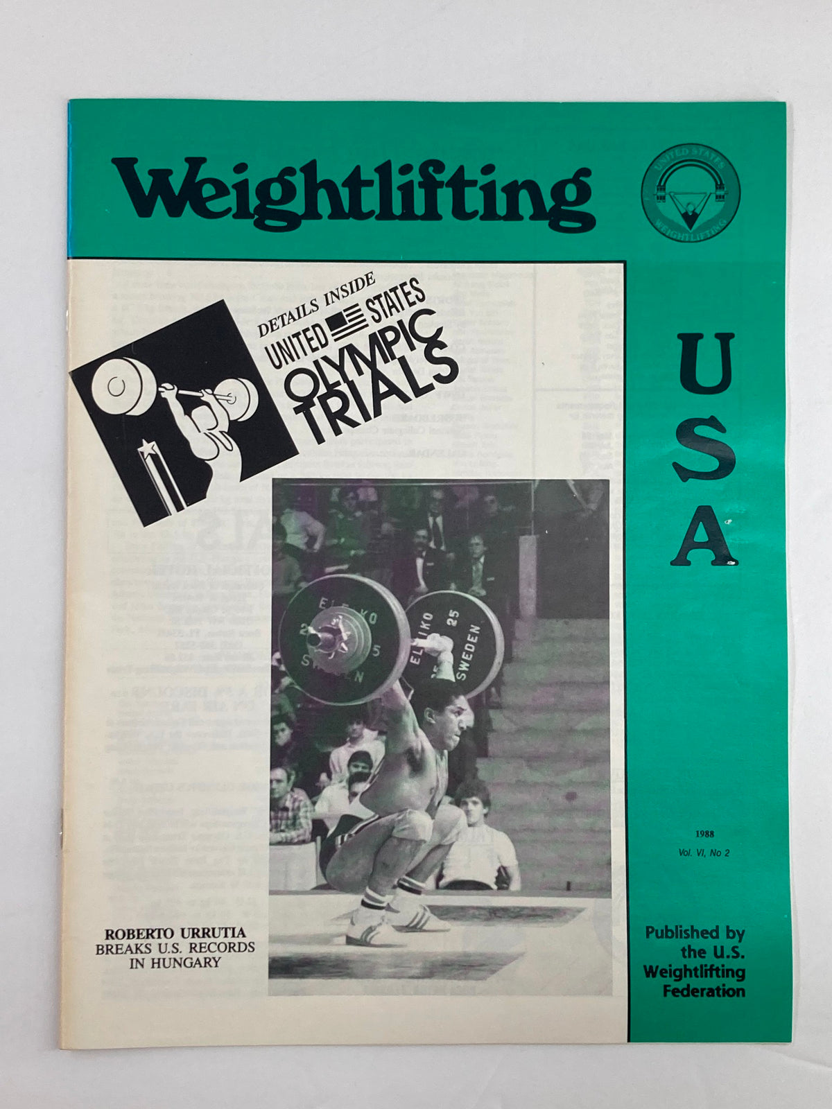 Cover of the VTG Weightlifting USA Magazine Volume 6 Issue 2 from 1988, featuring Roberto Urrutia breaking U.S. records in Hungary. The magazine showcases a weightlifter in action and highlights the U.S. Olympic Trials, capturing a moment in weightlifting history.