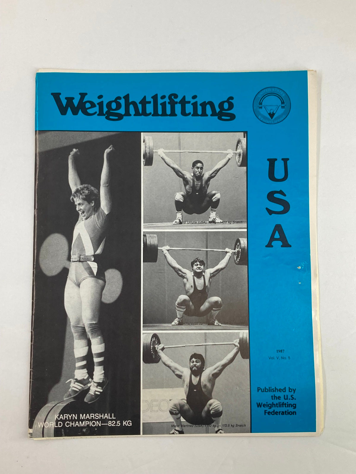 Vintage 1987 Weightlifting USA Magazine Volume 5 Number 5 featuring Karyn Marshall, World Champion at 82.5 kg, showcasing weightlifting athletes, published by the U.S. Weightlifting Federation.