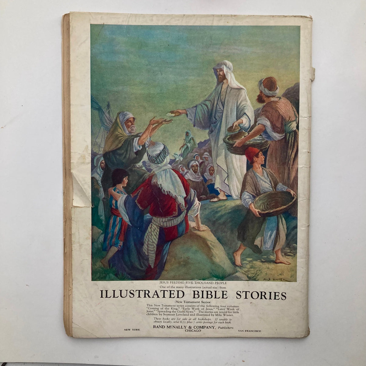 Advertisement page in VTG Child Life Magazine March 1928, showcasing 'Illustrated Bible Stories' with colorful illustrations and text.