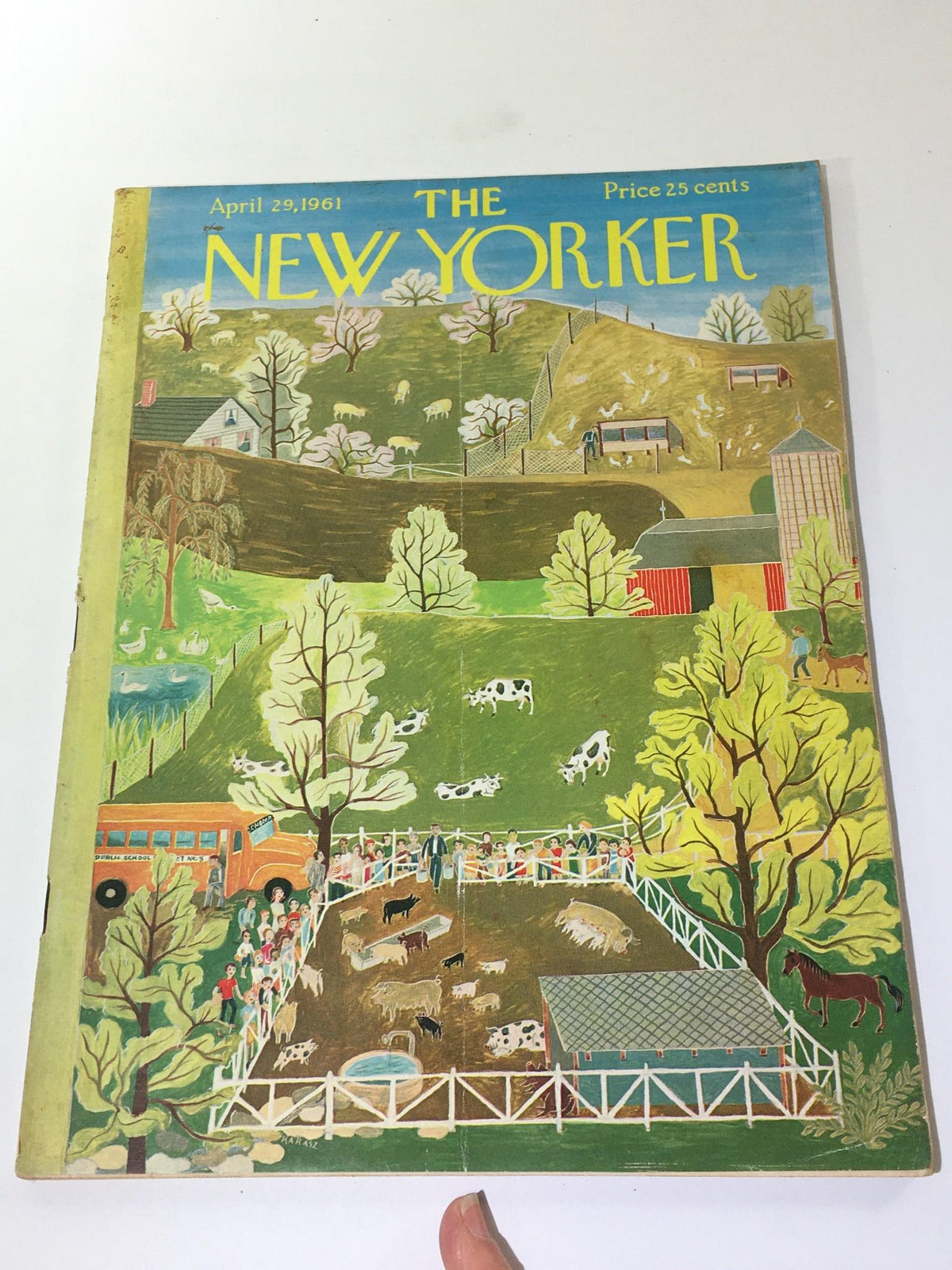The New Yorker magazine cover from April 29, 1961, showcasing a vibrant illustration by Ilonka Karasz, with farm animals, trees, and a school bus in a rural landscape.
