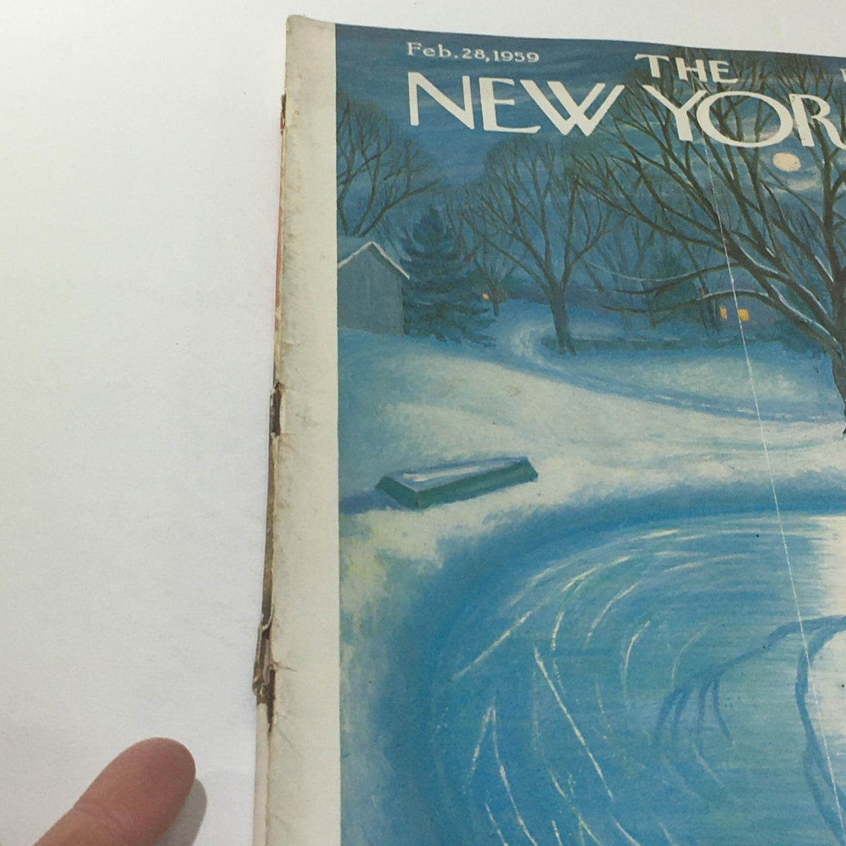 Side view of The New Yorker: February 28, 1959 cover, emphasizing Edna Eicke's artwork of a tranquil winter landscape with trees and a frozen pond.