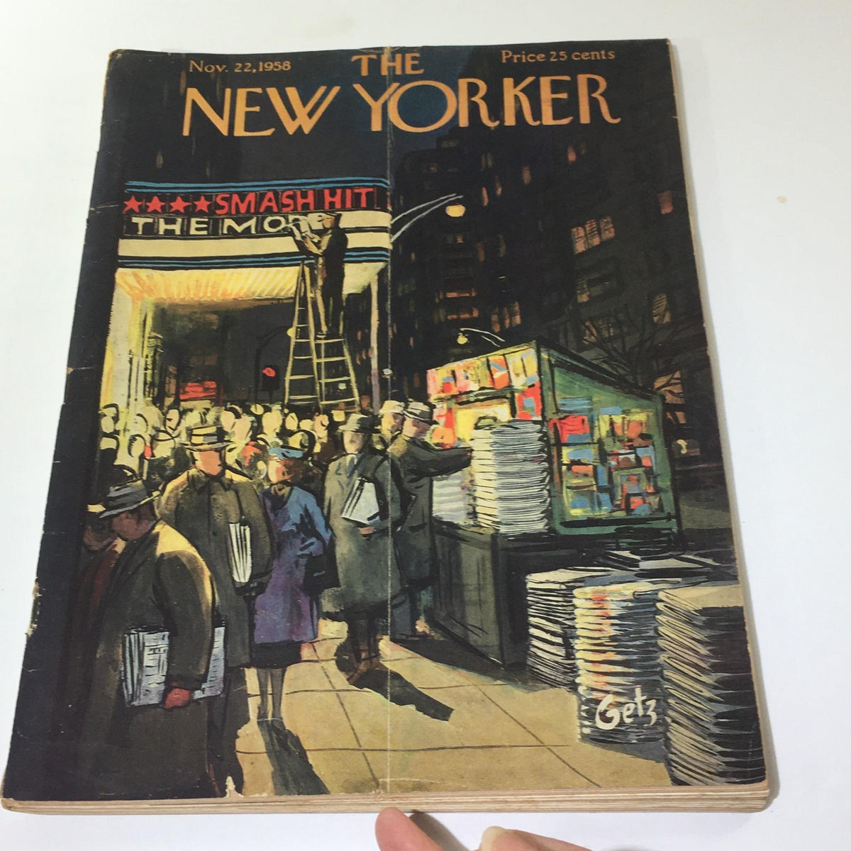 The New Yorker: November 22 1958 Full Magazine Cover by Arthur Getz displaying a bustling city atmosphere with individuals reading newspapers near a theater and newsstand.