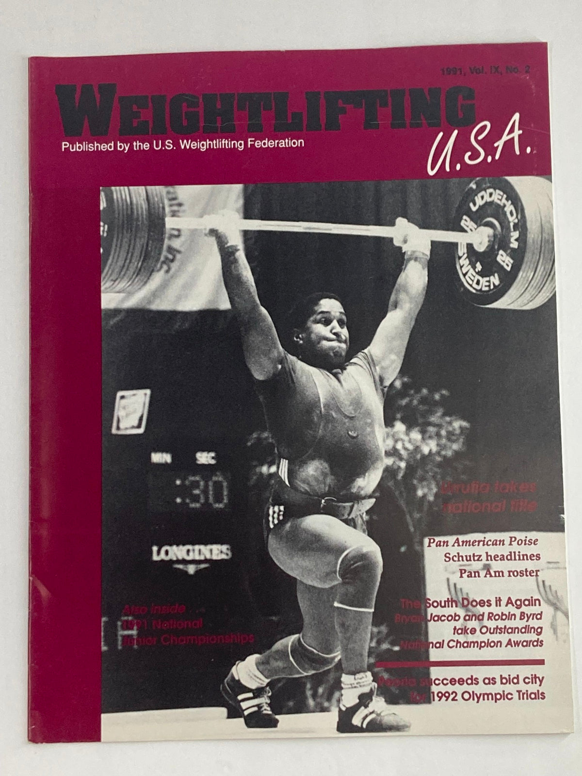 Cover of VTG Weightlifting USA Magazine Vol 9 #2 1991 featuring Roberto Urrutia during a weightlifting competition, showcasing key sports highlights and national title features.