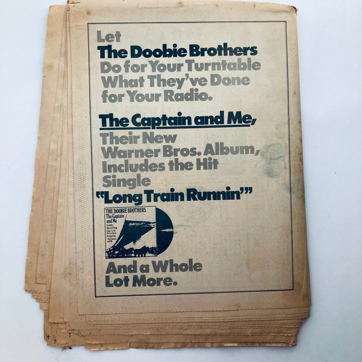Back cover of VTG Rolling Stone Magazine June 21 1973 Issue 137 featuring an advertisement for The Doobie Brothers' album 'The Captain and Me', highlighting the hit single 'Long Train Runnin''.
