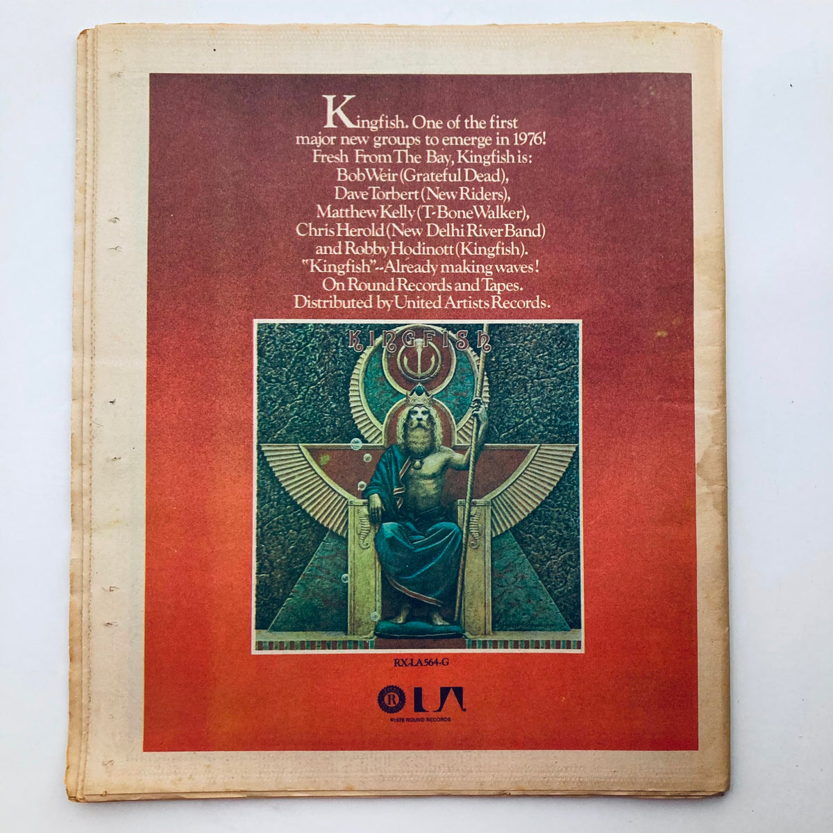 Back cover of the VTG Rolling Stone Magazine April 22, 1976 Issue 211 showcasing promotional content for the band Kingfish. The design reflects the artistic style of the 1970s music memorabilia.