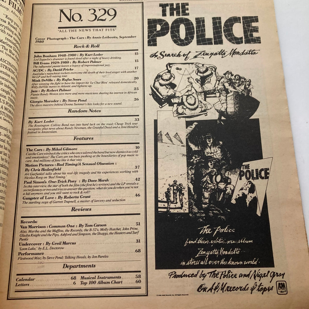 Inside page of Vintage Rolling Stone Magazine October 30, 1980, Issue 329, displaying the contents and features related to The Cars, Art Garfunkel, and more iconic music content from the era.