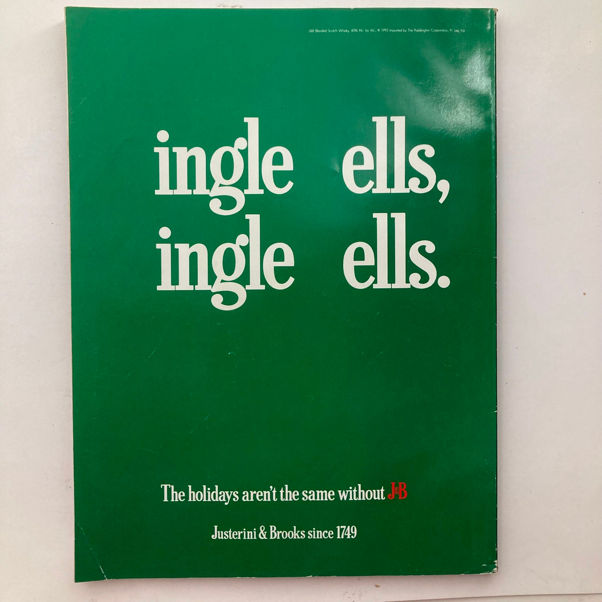Back cover of Playboy Magazine January 1993 Vol 40 No. 1 featuring a green design with text, representing classic advertising style.