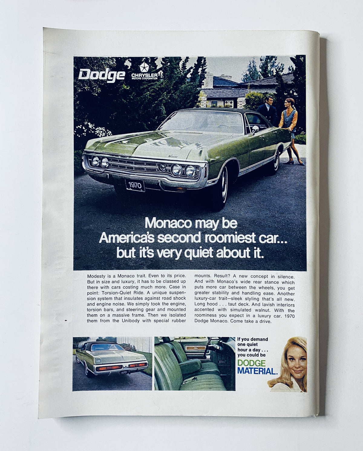 A vintage advertisement for a 1970 Dodge Monaco showcasing its spacious interior with the tagline 'Monaco may be America's second roomiest car... but it's very quiet about it'.