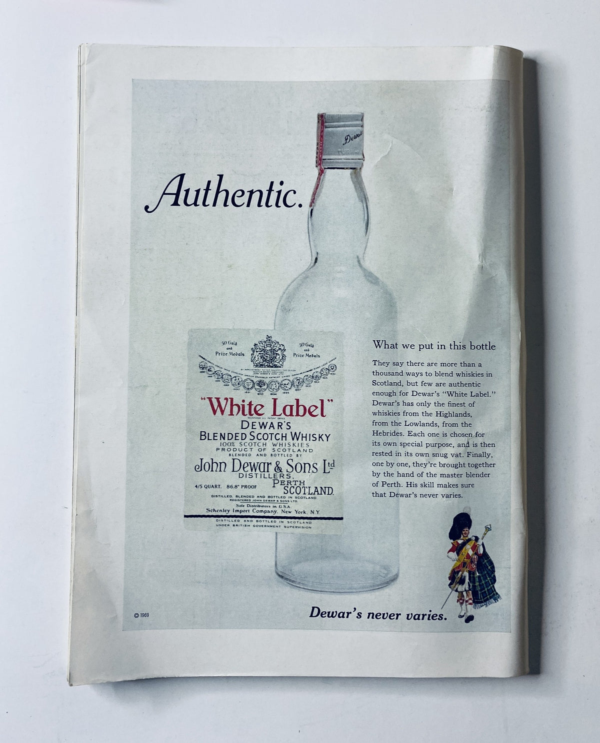 Advertisement for Dewar's White Label whisky featured in The New Yorker Magazine September 20, 1969, emphasizing the brand's authenticity and heritage.
