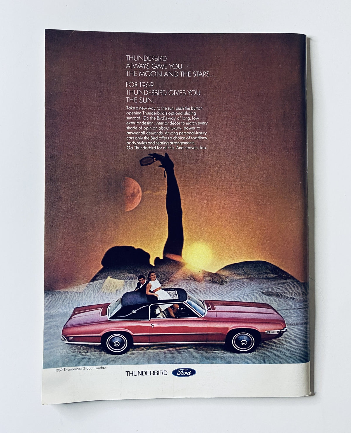 Advertisement page from The New Yorker Magazine March 8, 1969 for the Thunderbird car, showcasing a convertible in a desert landscape with a couple, highlighted by the slogan about the moon and the stars.