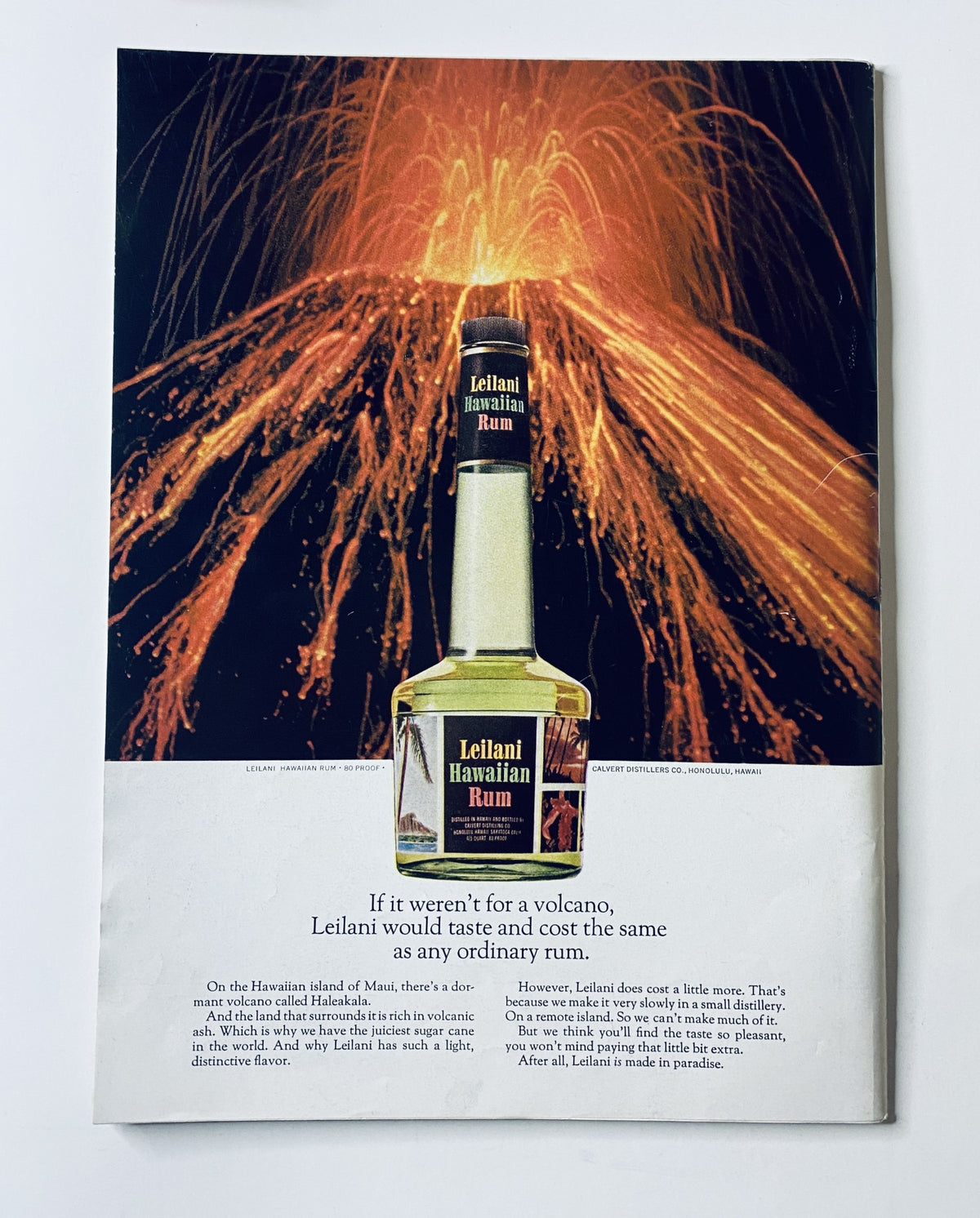 Advertisement for Lelani Hawaiian Rum featured in The New Yorker Magazine July 26, 1969, displaying a bottle against a backdrop of fireworks.