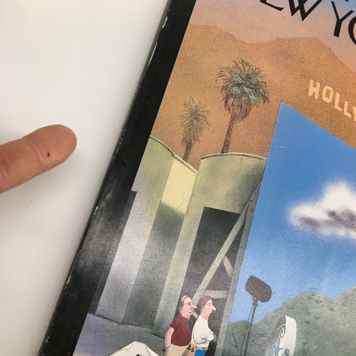 Close-up view of the spine of The New Yorker Full Magazine October 20 2003 The Illusion by Ian Falconer, highlighting minor wear and the address label.