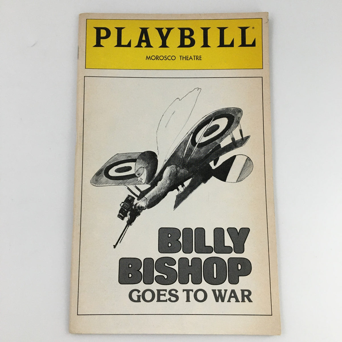 Cover of the 1980 Playbill for Morosco Theatre production 'Billy Bishop Goes to War' featuring an illustrative design of a vintage airplane.