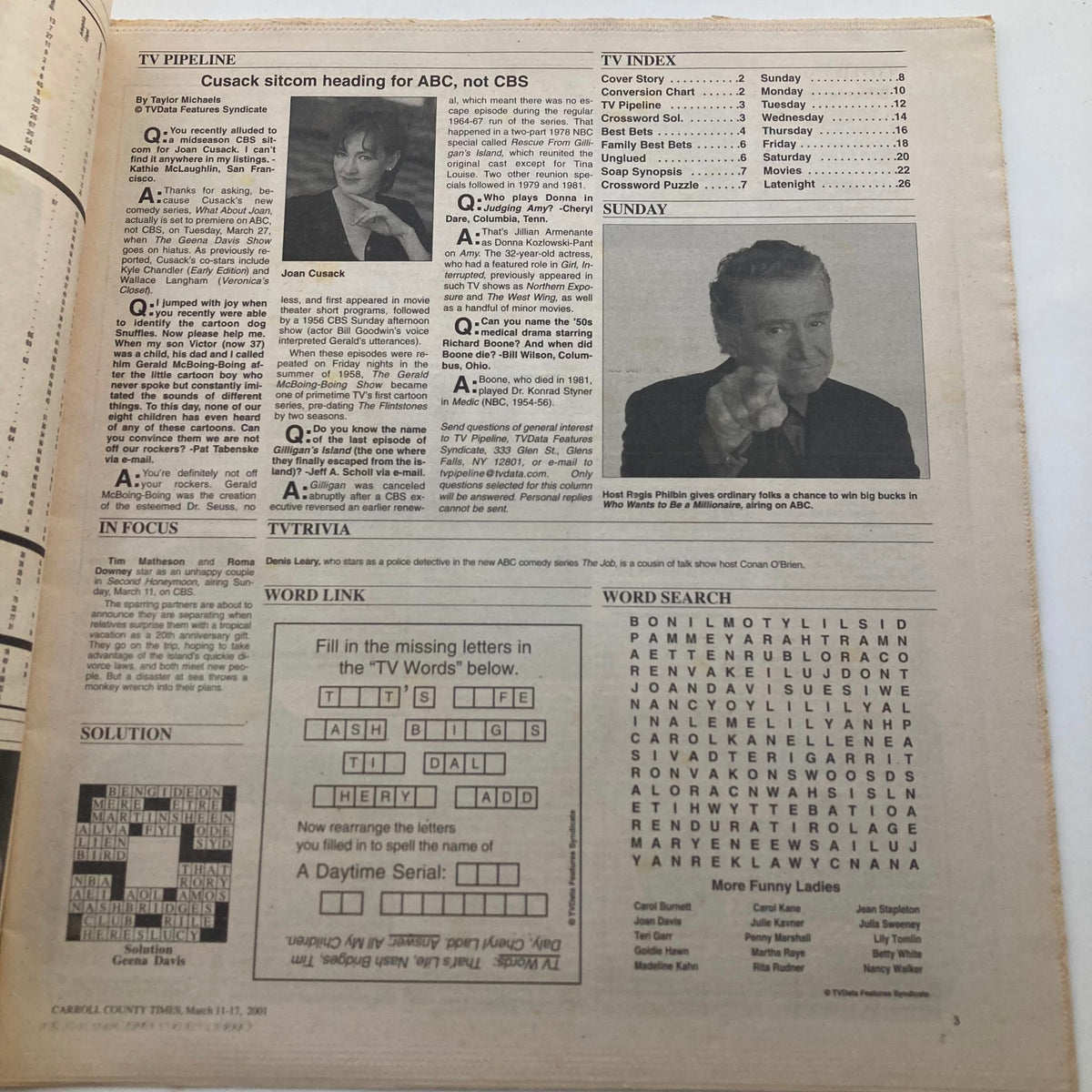 Inside page of TV Week Magazine from March 11, 2001, with a TV index and a crossword puzzle related to television, featuring questions about the sitcom The Job and other programming.