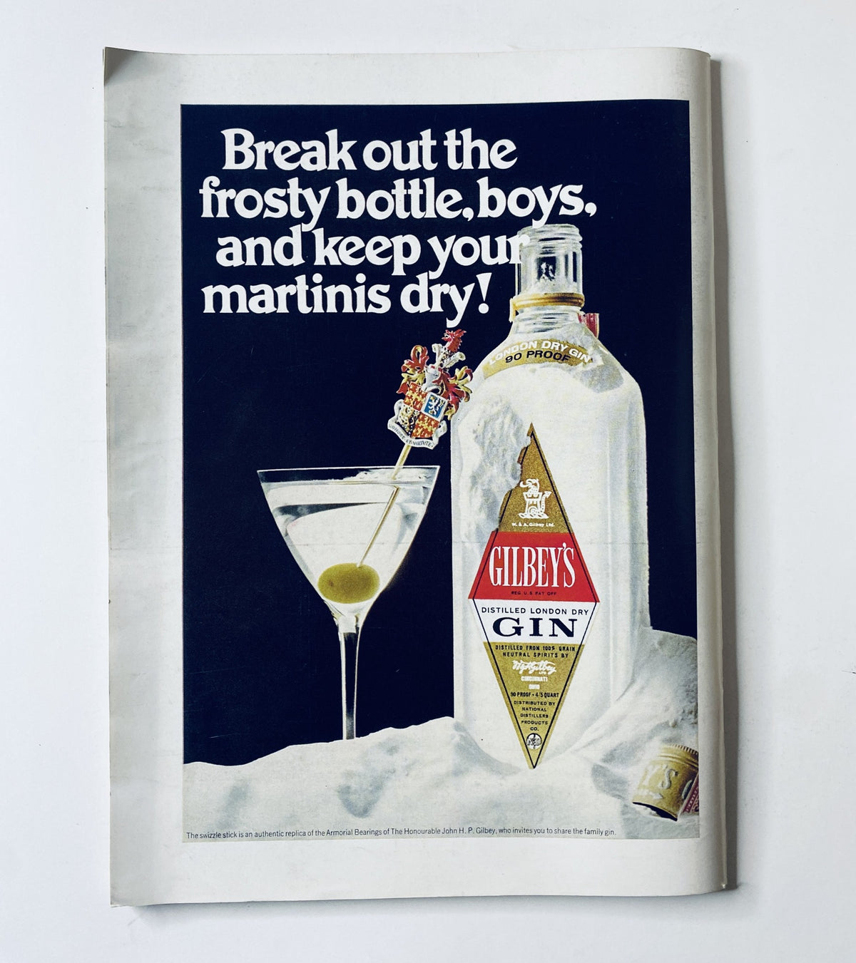 Advertisement for Gilbey's Gin found in The New Yorker Magazine March 29, 1969. The ad features a frosty gin bottle next to a glass of cocktail, promoting a dry martini.