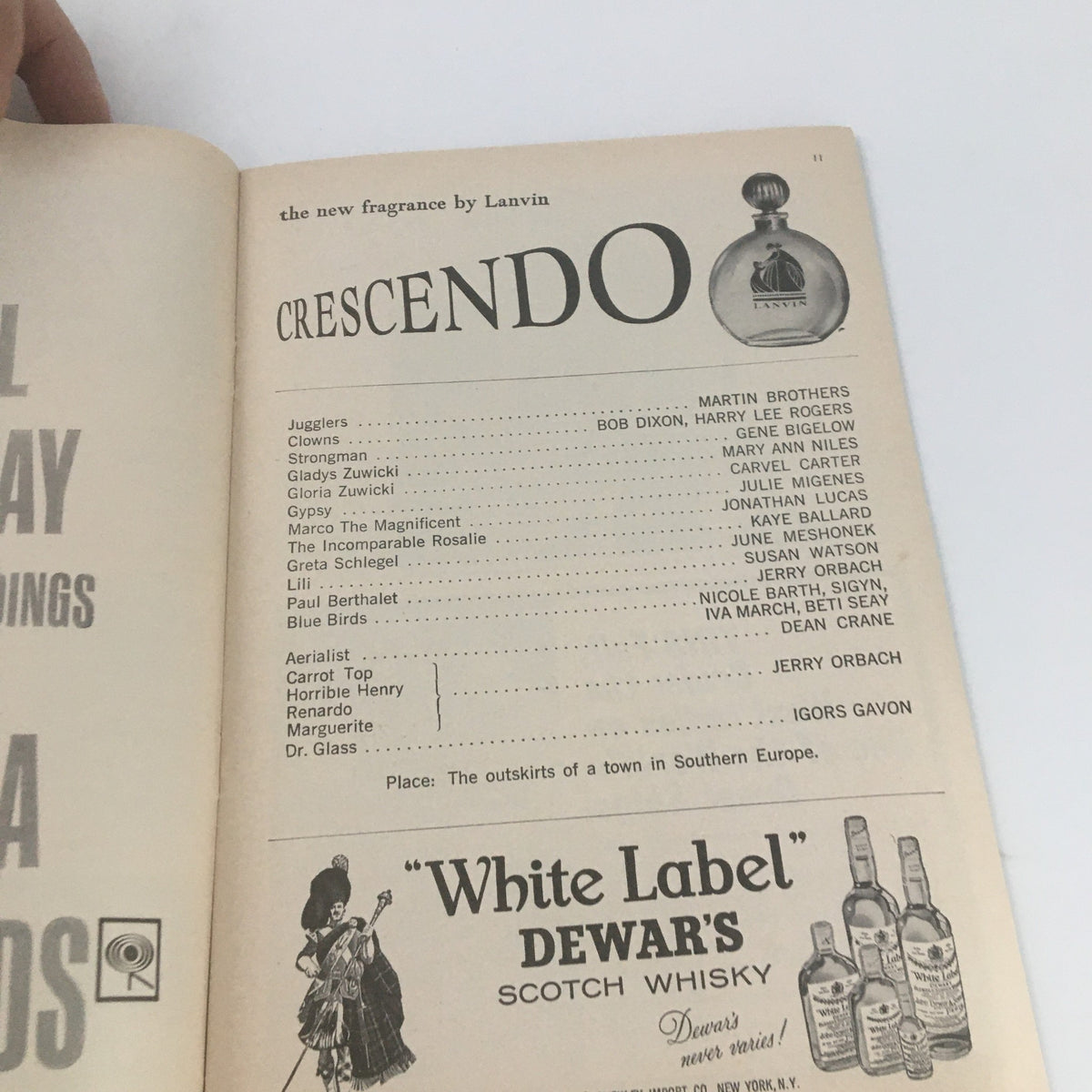 Advertisment page from the 1962 Playbill for 'Carnival' at the Imperial Theatre, showcasing products like 'Cinzanо' and 'White Label Dewar's'.