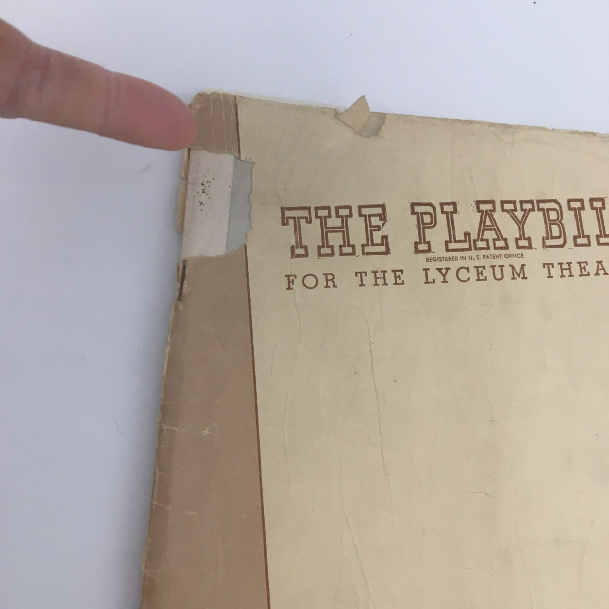 Close-up of the 1947 Playbill for the Lyceum Theatre 'Born Yesterday', highlighting the condition and details on the cover.