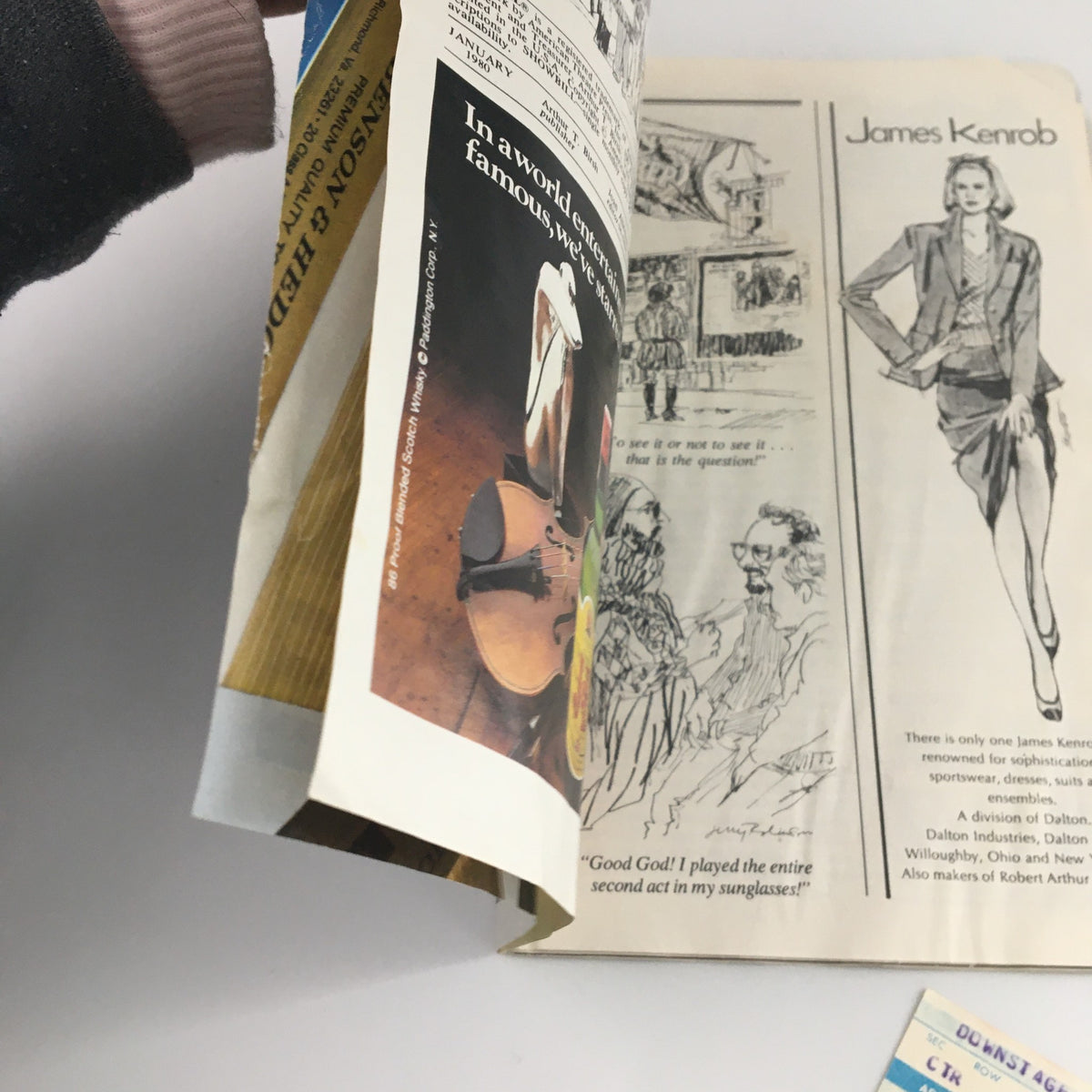 Close-up view of a vintage magazine page featuring illustrations and advertisements, part of the 1980 Showbill Manhattan Theatre Club 'Endgame' James Barbosa, Michael Gross.