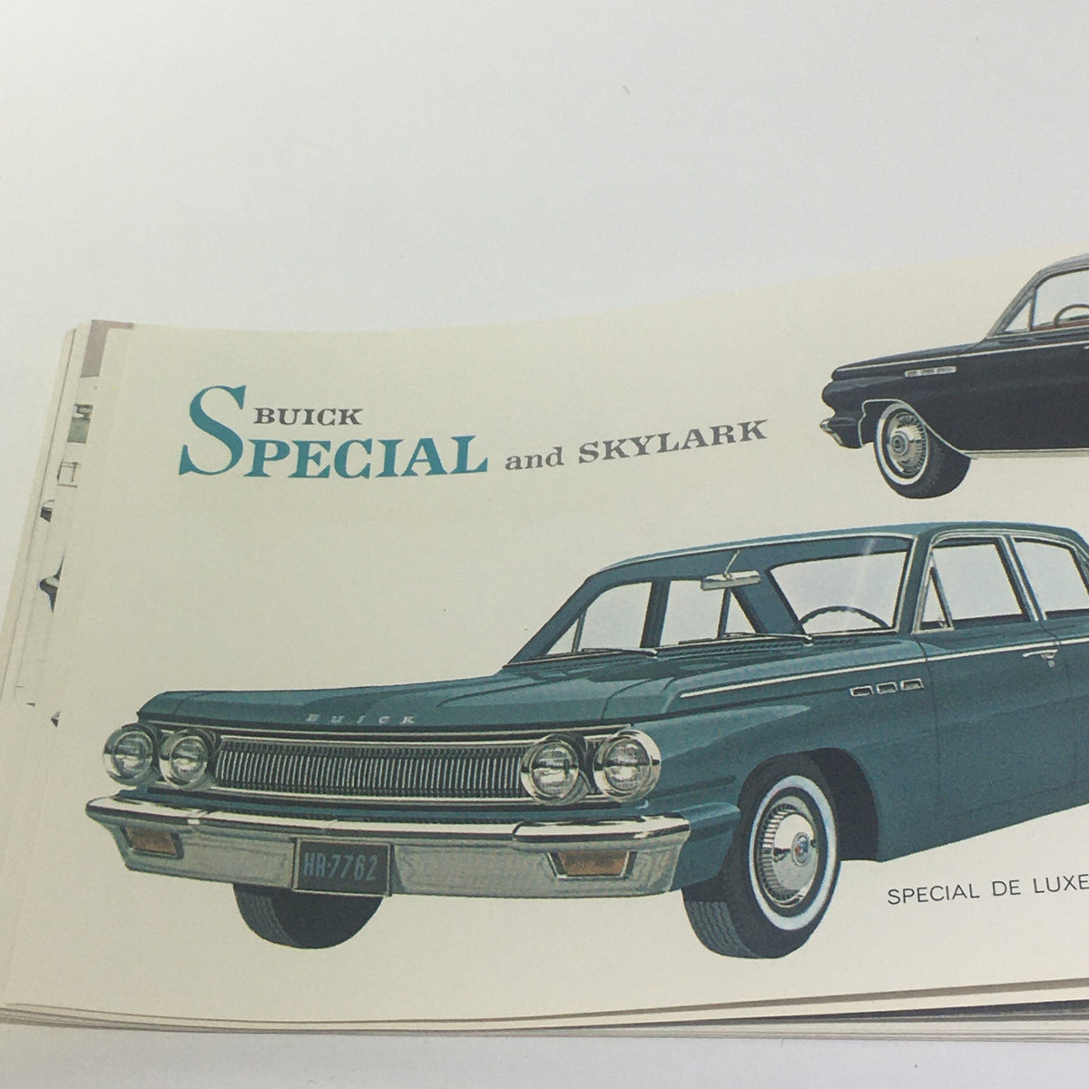 Illustration from the Vintage Go GM Any Time in the year 1963 Chevrolet-Pontiac-Buick Car Catalog showcasing the Buick Special and Skylark models.