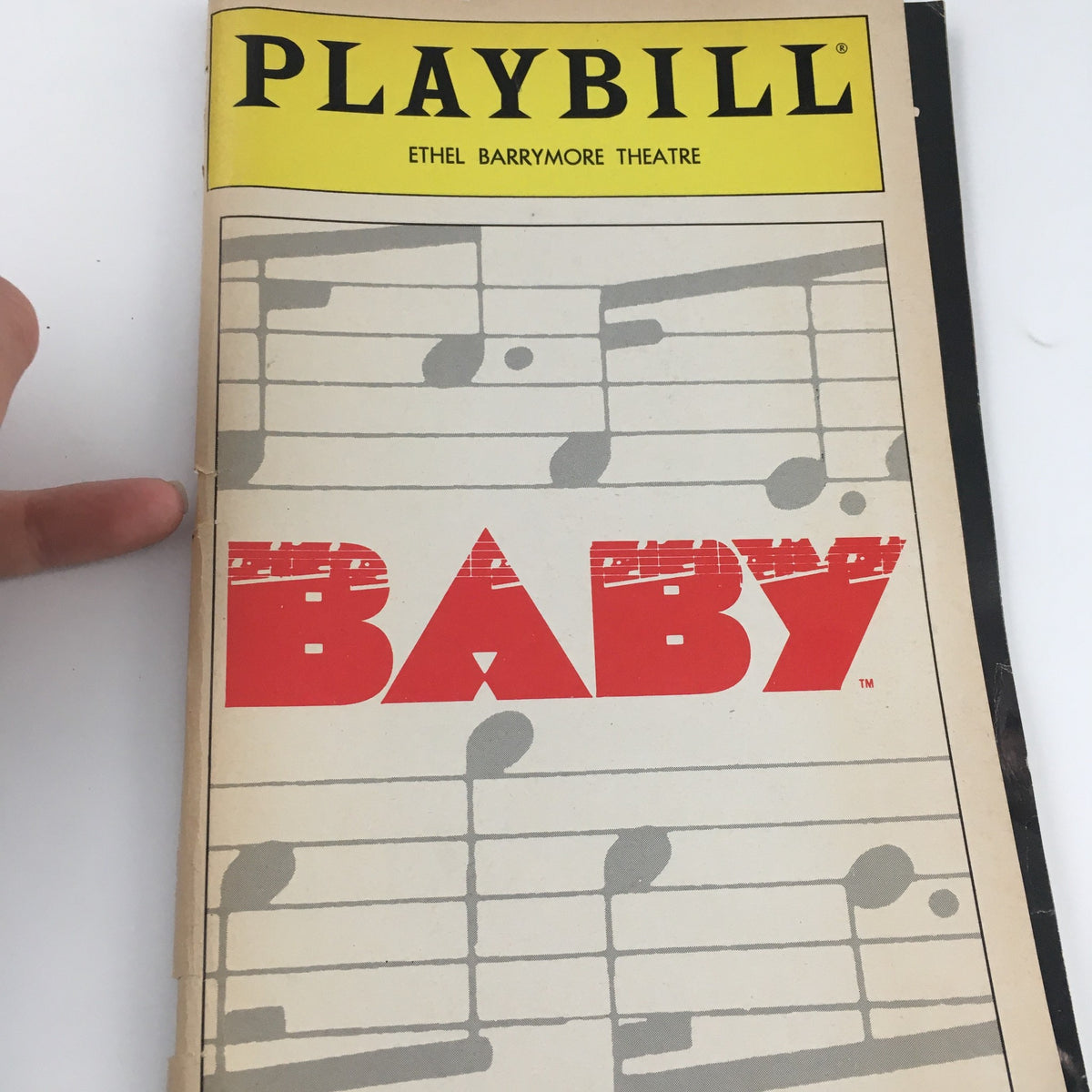 Front cover of the 1986 Playbill from Ethel Barrymore Theatre's 'Baby', showcasing a musical theme with the title 'BABY' prominently displayed.